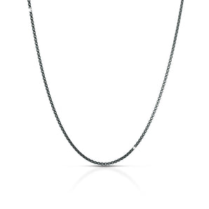 Catena in titanio con
moschettone ed elemento
in argento