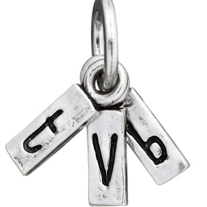 Charm Giovanni Raspini con scritta TVB